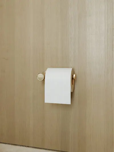 Uchwyt na papier toaletowy Liora - złoto szczotkowane